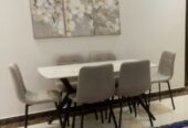 SAR 750 – Almost New Elegant 6-Seater Sintered Stone Dining Table Set